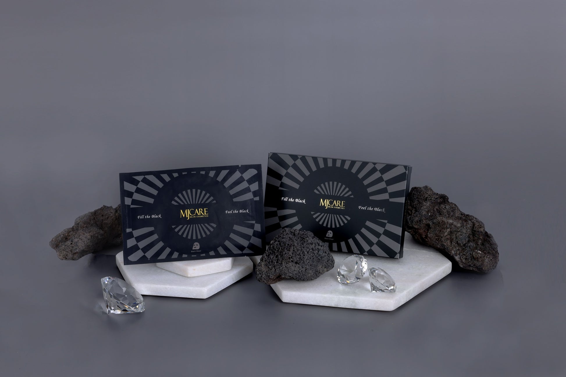 Masque visage purifiant au charbon MJ Care présenté avec pierres et décor premium